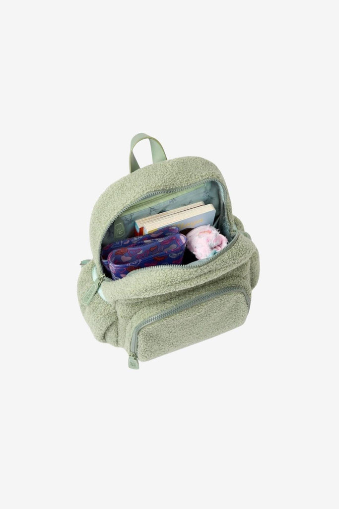Children's sage green Ava teddy fleece backpack with open pocket showing the interior 