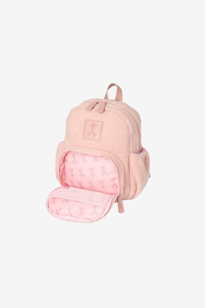 Front view of blush pink Ava children's teddy fleece backpack with open front zip pocket 