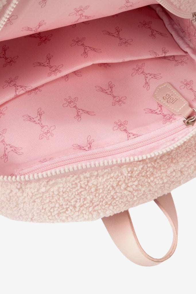 Interior lining of Ava blush pink kids backpack with giraffe pattern 