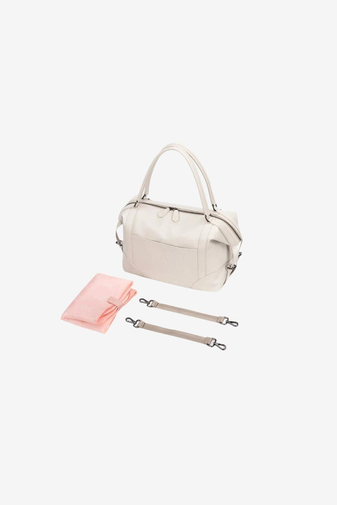 Beige bambino changing bag with pink changing mat and pram clips 
