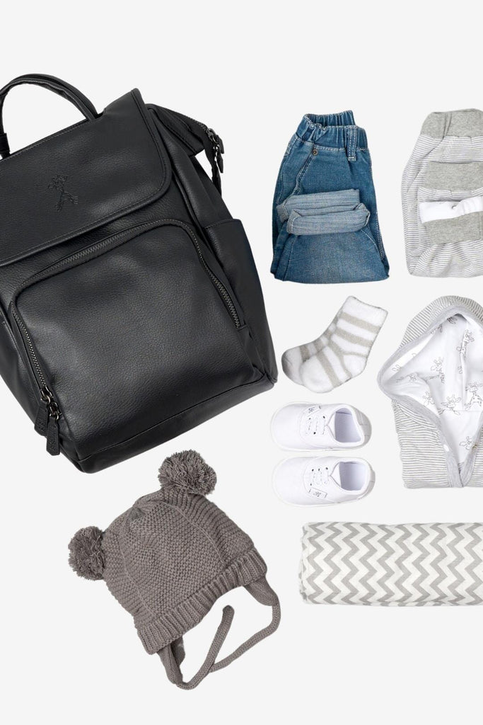 Black vegan leather diaper bag with baby essentials 