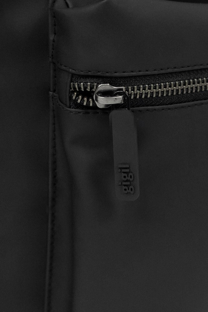 Close up image of the branded Gigil Zip pull on the recycled Coast Changing Bag.
