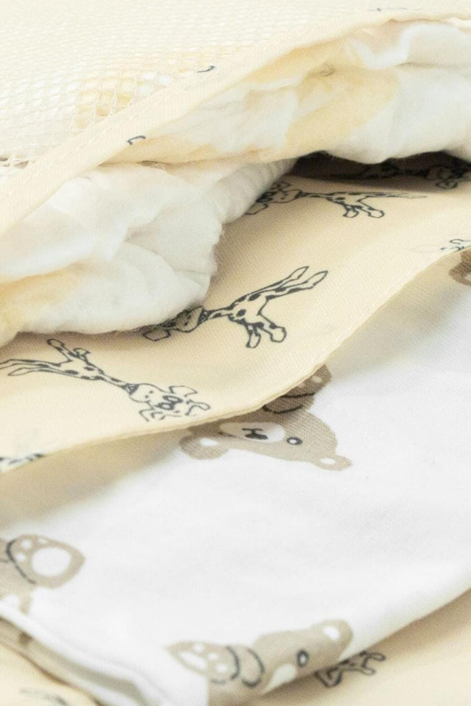 Close up image of the compartment/sections inside the Beige Nappy Pouch 