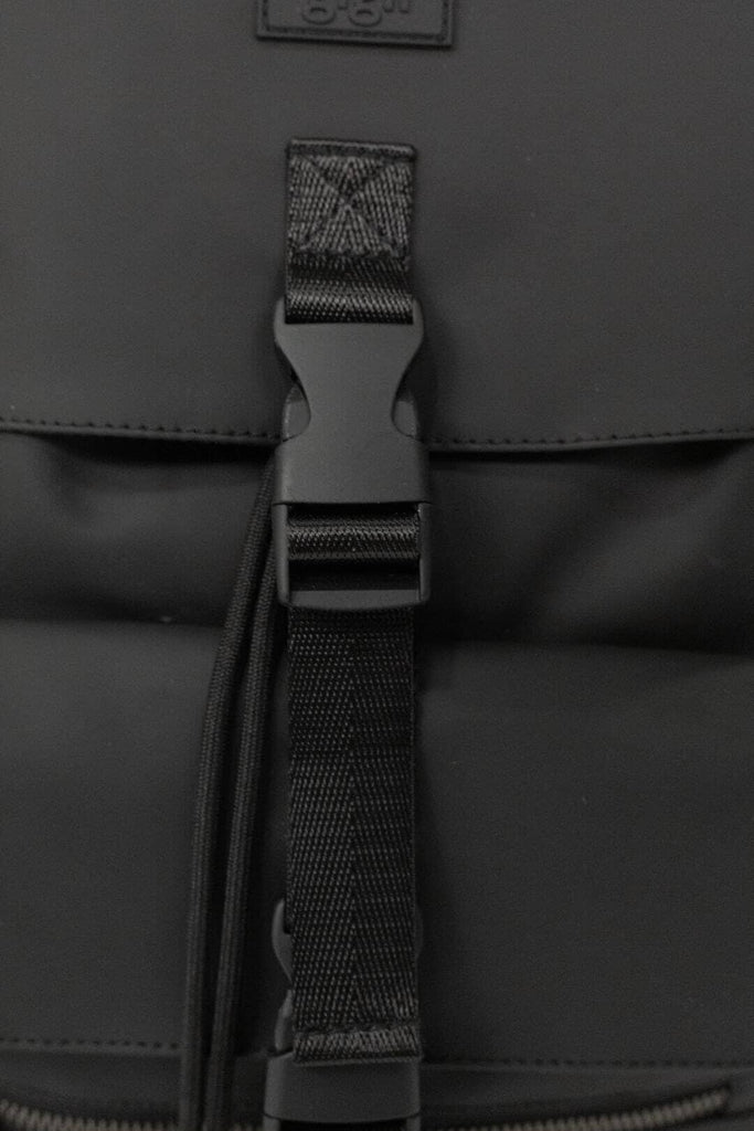 Close up image of the plastic clip fastener on the Nova - Charcoal Black Changing Bag.