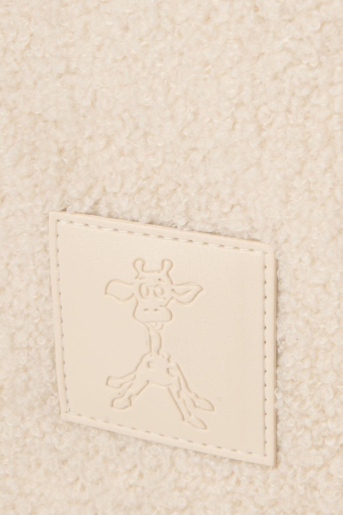 Close up of teddy nappy caddy giraffe logo patch 