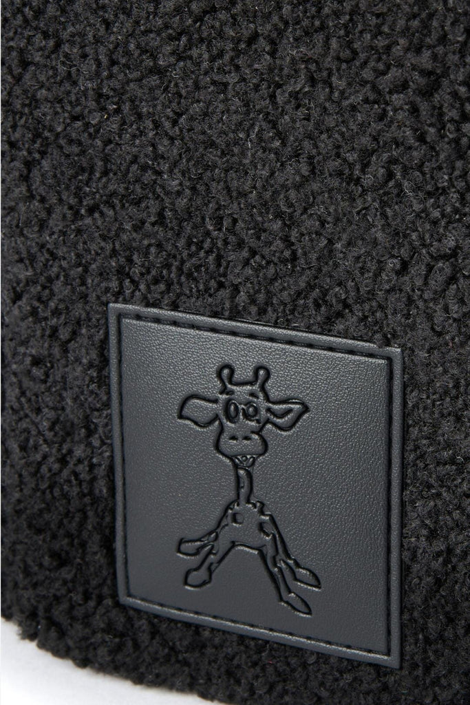 Vegan leather giraffe logo patch on teddy fleece nappy caddy 