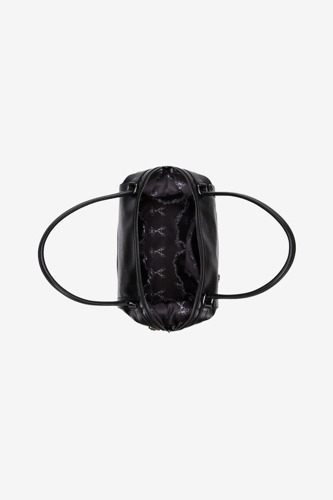 open view of the black vegan leather diaper bag with giraffe print interior lining