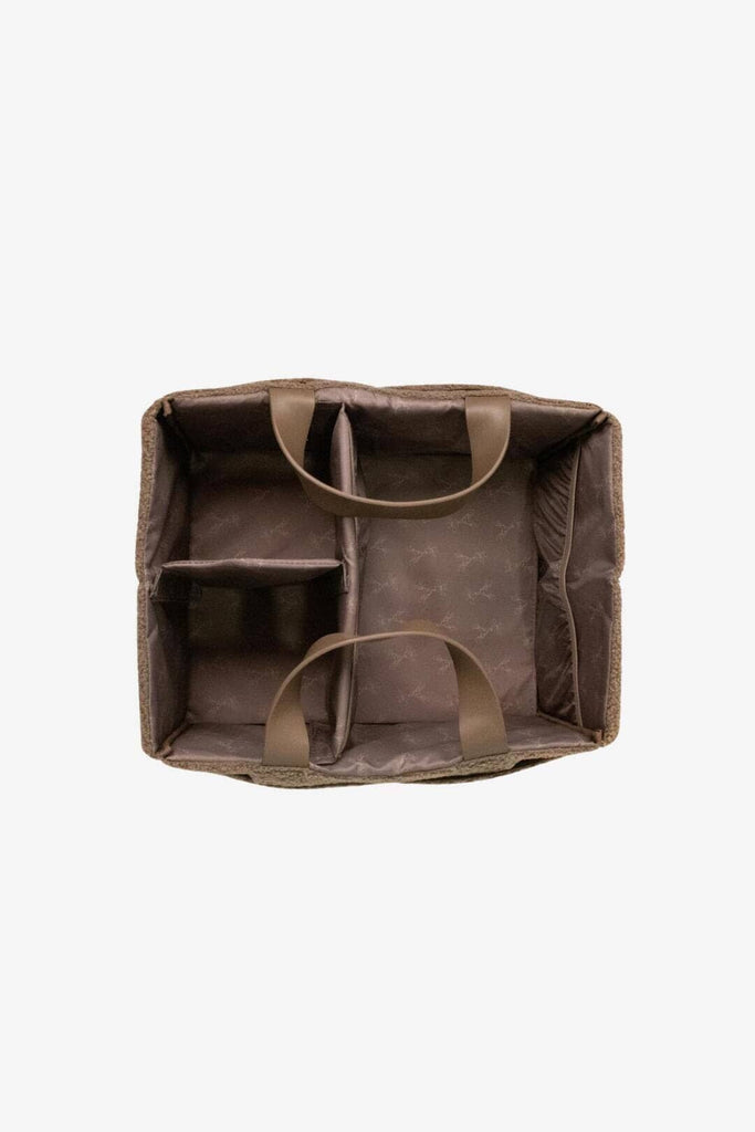 Top down view of empty brown mocha teddy nappy caddy with giraffe print interior lining and three compartments 