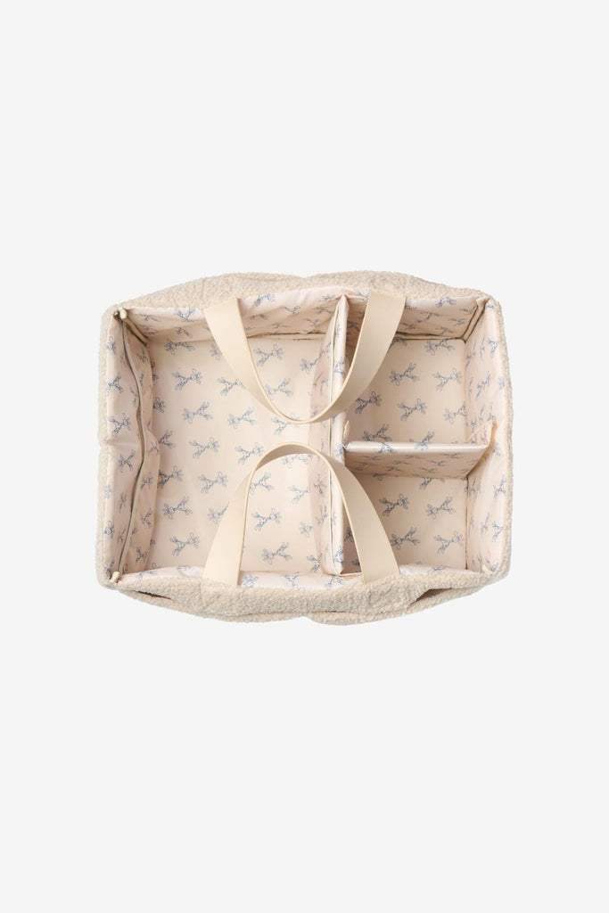 Cream teddy nappy caddy with matching giraffe lining and vegan leather handles 